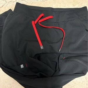 Women’s Fabletics scrub joggers with Red Drawstrings:
